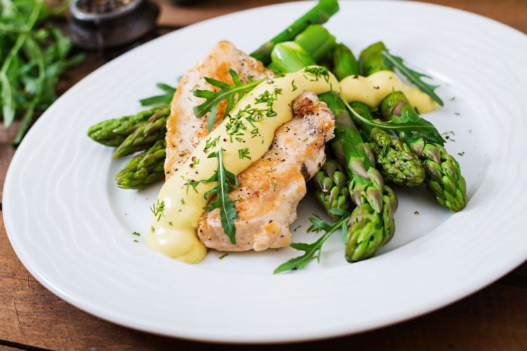 baked-chicken-garnished-with-asparagus-herbs.jpg